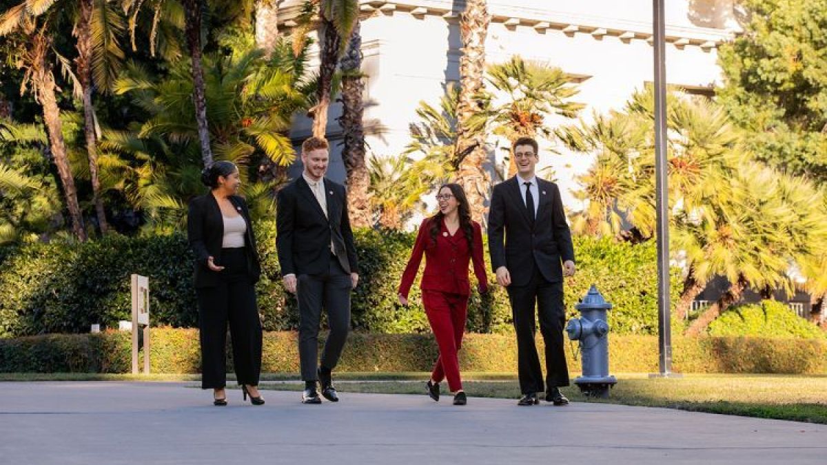 4 students walking at the Capitol